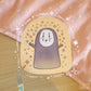 A sticker depicting a masked character throwing gold.