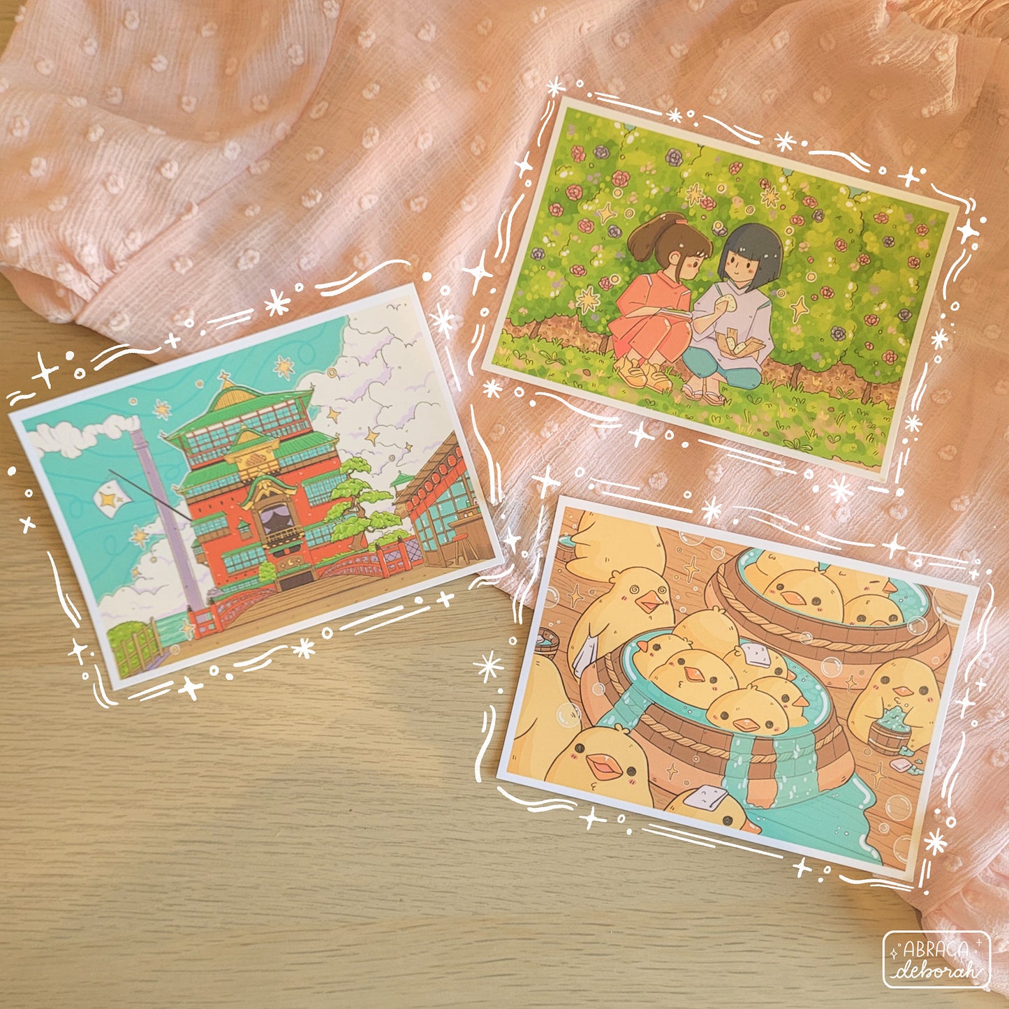 Three postcard prints featuring: two friends sharing riceballs, ducks enjoying a sauna, and a Japanese style bathhouse.