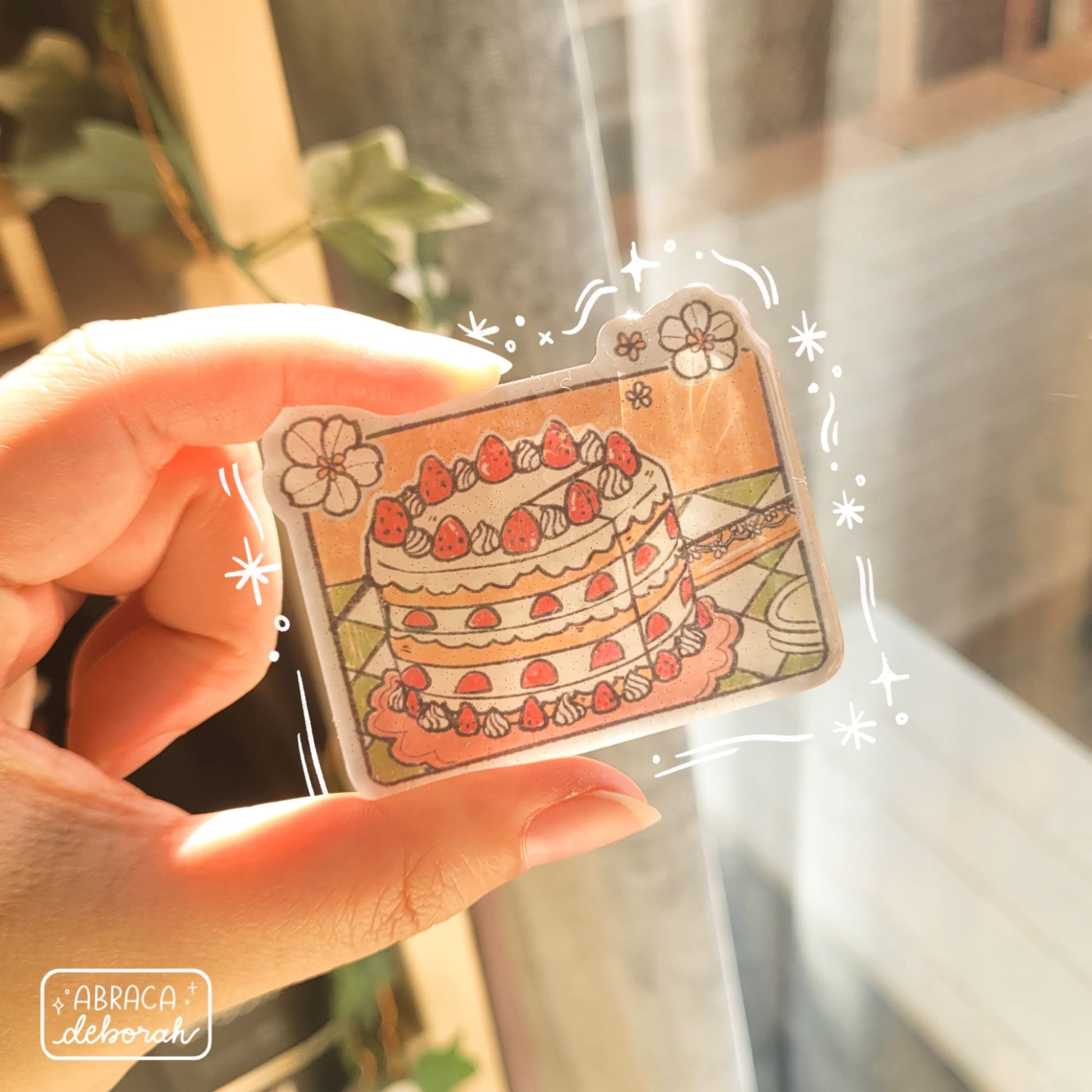 Rectangular acrylic magnet depicting a strawberry shortcake.