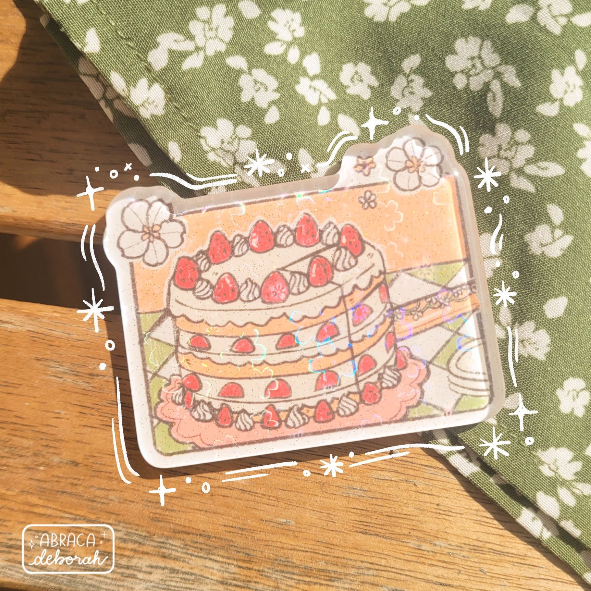 Rectangular acrylic magnet depicting a strawberry shortcake.