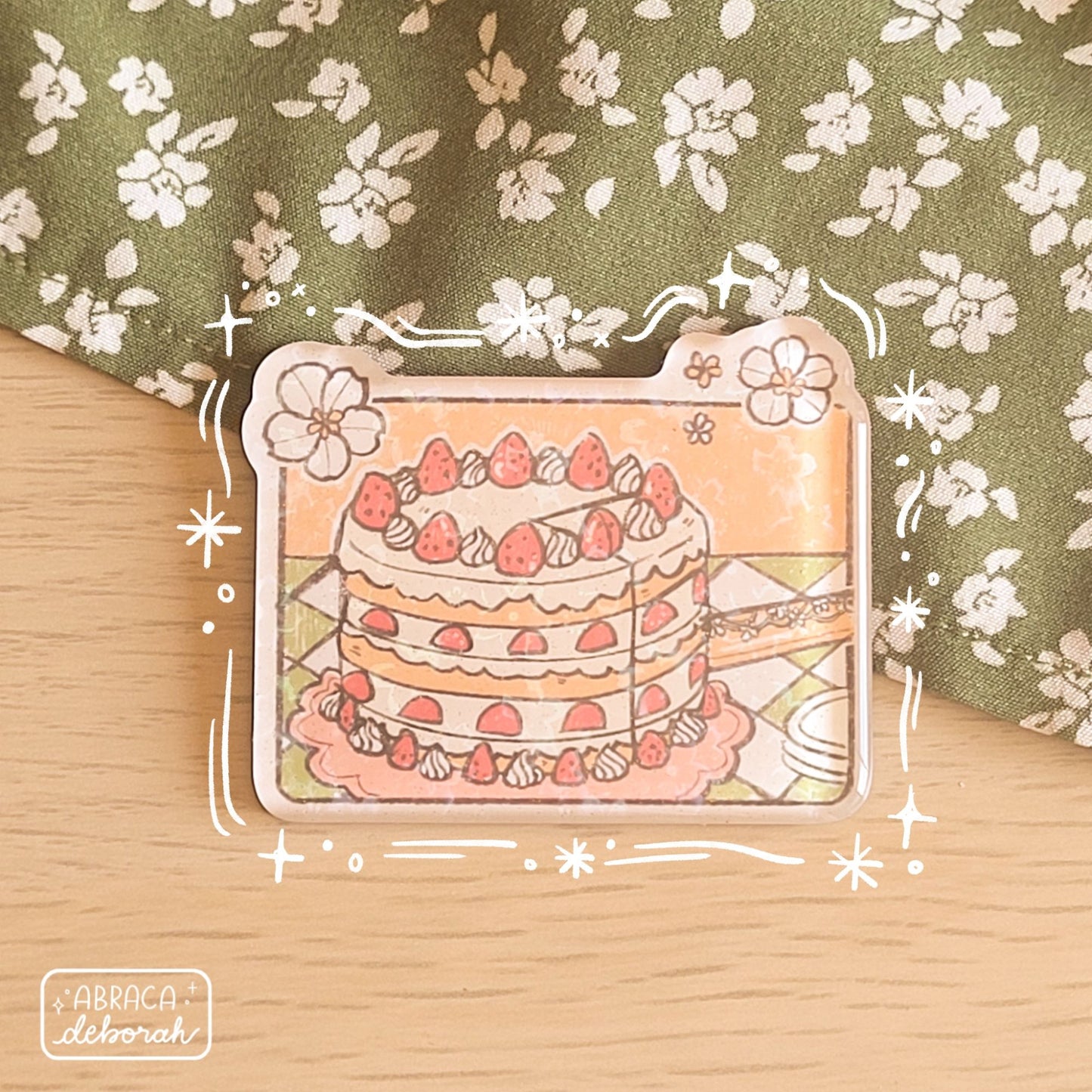 Rectangular acrylic magnet depicting a strawberry shortcake.