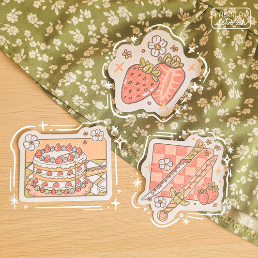 Three stickers: strawberries, cake, and two swords.