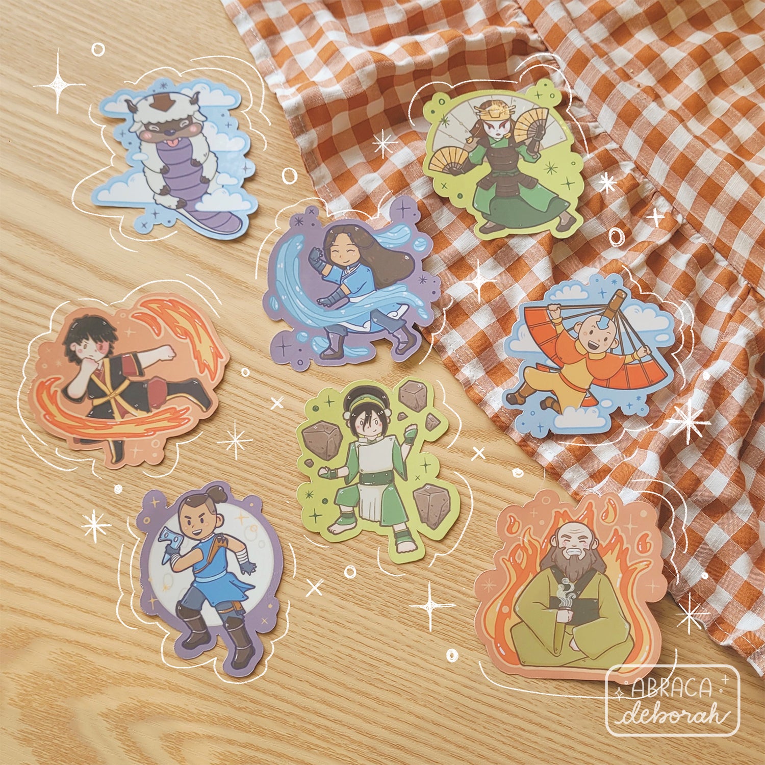 8 stickers depicting different characters on them.